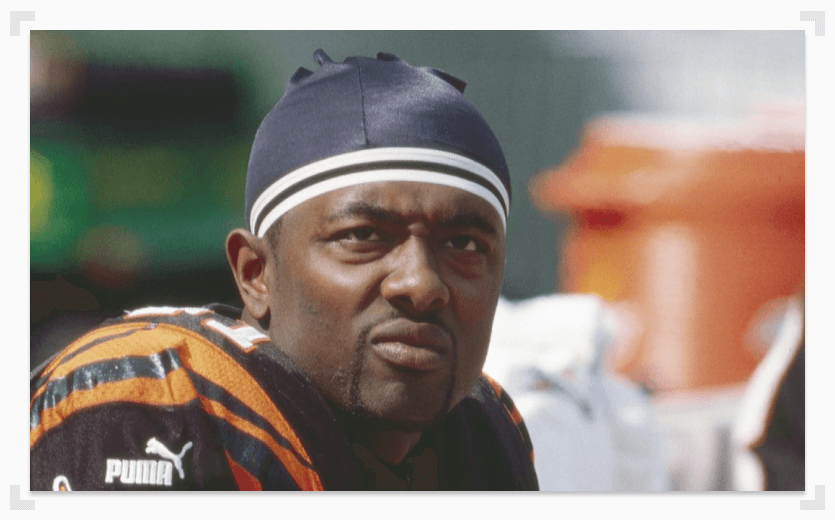 Akili Smith on sideline staring off