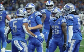 Detroit Lions players celebrate after scoring a touchdown