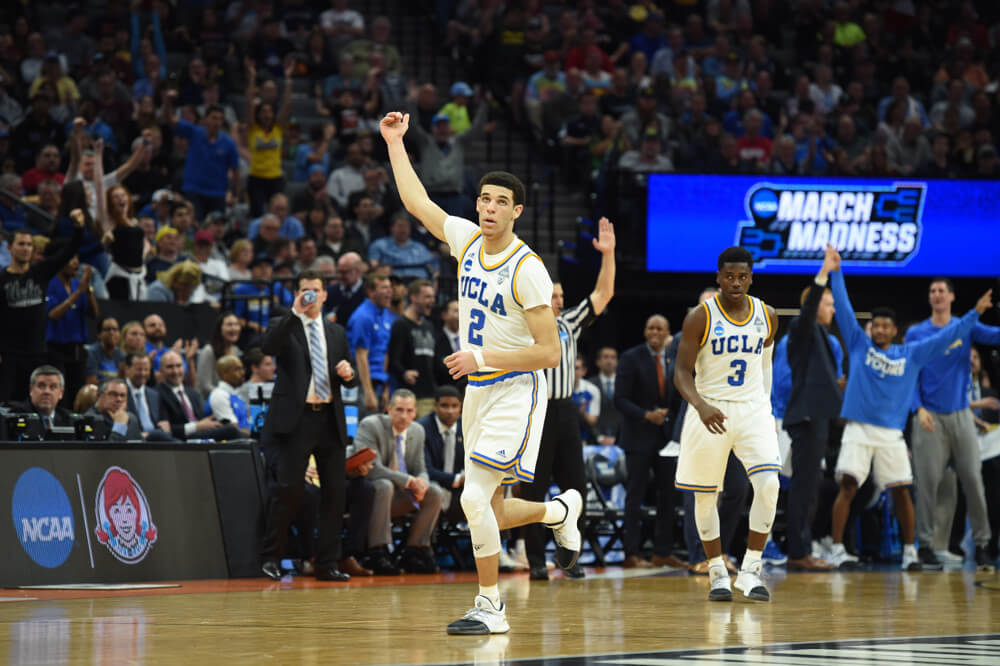 UCLA guard Lonzo Ball celebrates after making a three-point shot