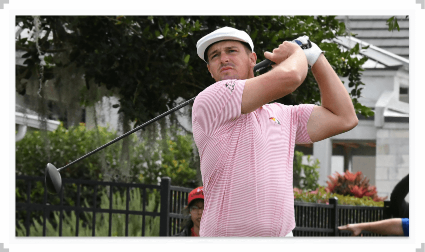 Bryson DeChambeau watching golf ball after swinging