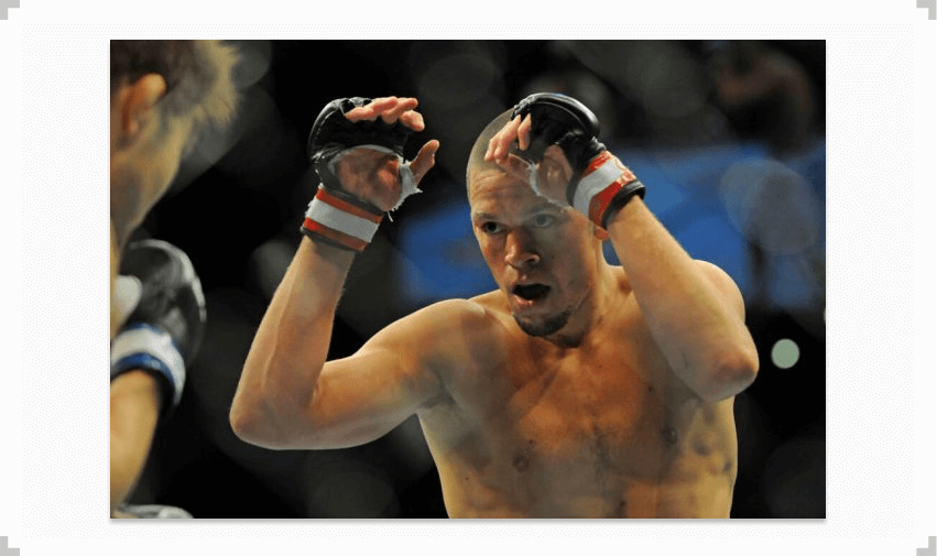 Nate Diaz hands raised during a fight