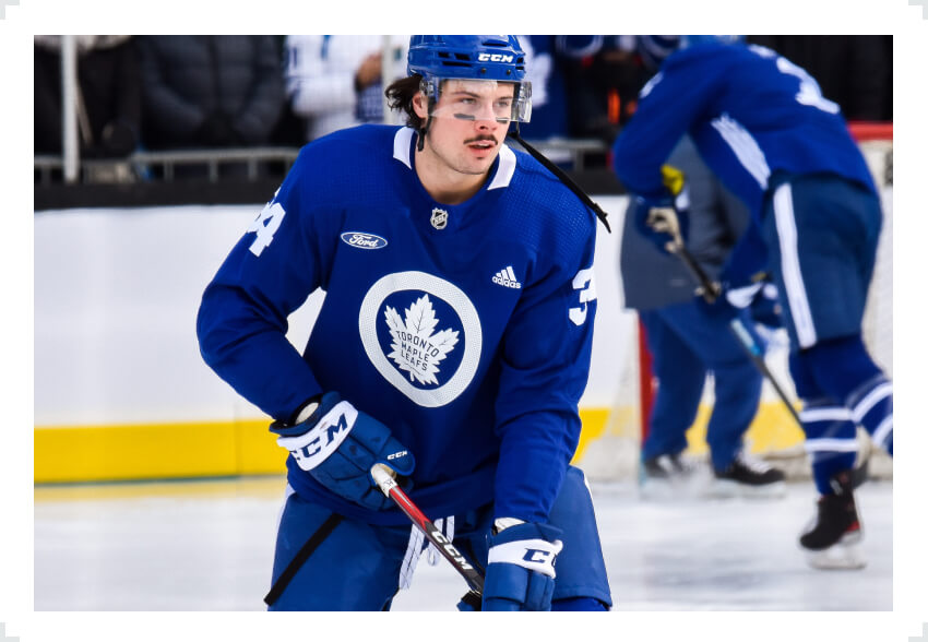 Auston Matthews skating two hands on stick Winter Classic jersey
