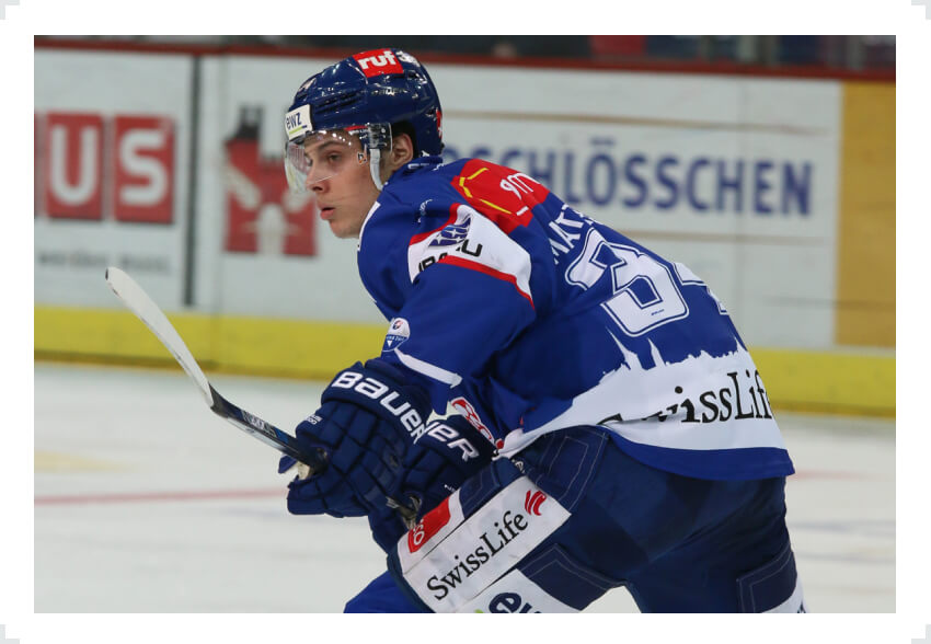 Auston Matthews skating wearing Zurich ZSC Lions jersey