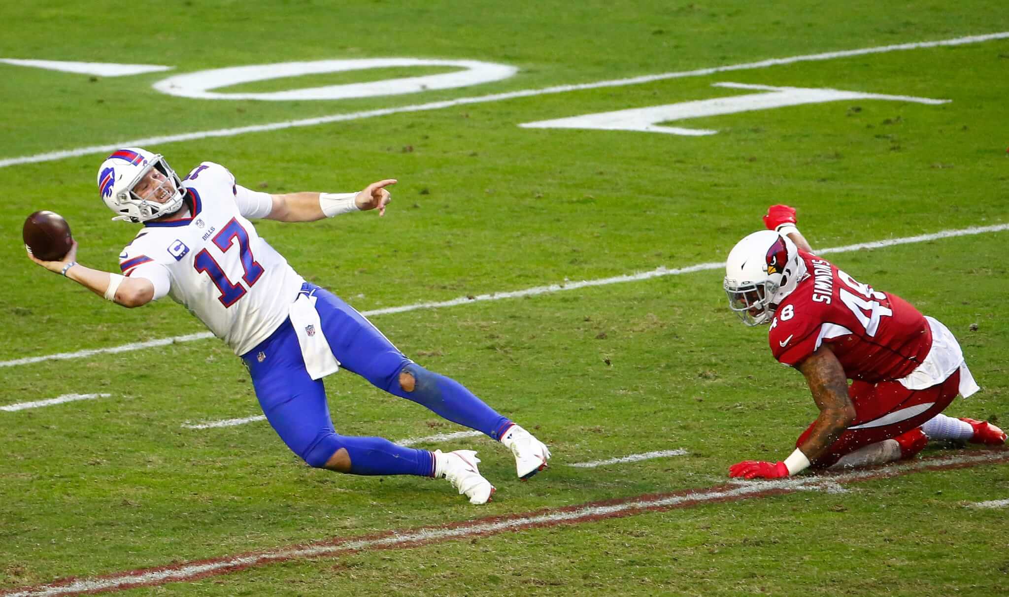 Josh Allen throwing football Isaiah Simmons Bills Cardinals