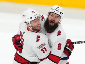 Jordan Staal, Brent Burns celebrate; Carolina Hurricanes