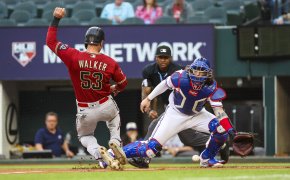 Arizona Diamondbacks first baseman Christian Walker scoring a run against the Texas Rangers