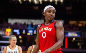 Jackie Young standing on court
