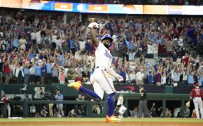 Texas Rangers Adolis Garcia rounding the bases after a walk-off home run