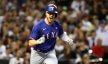 Texas Rangers catcher Mitch Garver celebrating an RBI single