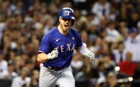 Texas Rangers catcher Mitch Garver celebrating an RBI single