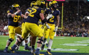 Michigan running back Blake Corum celebrating a touchdown