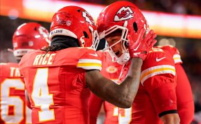 Kansas City Chiefs quarterback Patrick Mahomes (15) celebrates with wide receiver Rashee Rice (4)