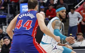 Charlotte Hornets forward Miles Bridges dribbles against Detroit Pistons forward Bojan Bogdanovic