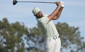 Tony Finau hitting a tee shot