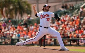 Baltimore Orioles starting pitcher Corbin Burnes throwing during spring training