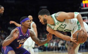 Phoenix Suns guard Bradley Beal guards Boston Celtics forward Jayson Tatum