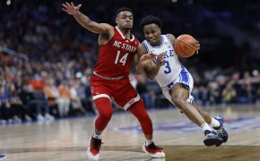 Duke Blue Devils guard Jeremy Roach drives around North Carolina State Wolfpack guard Casey Morsell