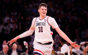 Connecticut Huskies center Donovan Clingan celebrates as the clock winds down