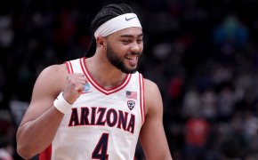 Arizona Wildcats guard Kylan Boswell fist-pumping after a basket