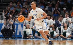 North Carolina Tar Heels guard Seth Trimble dribbles a basketball.